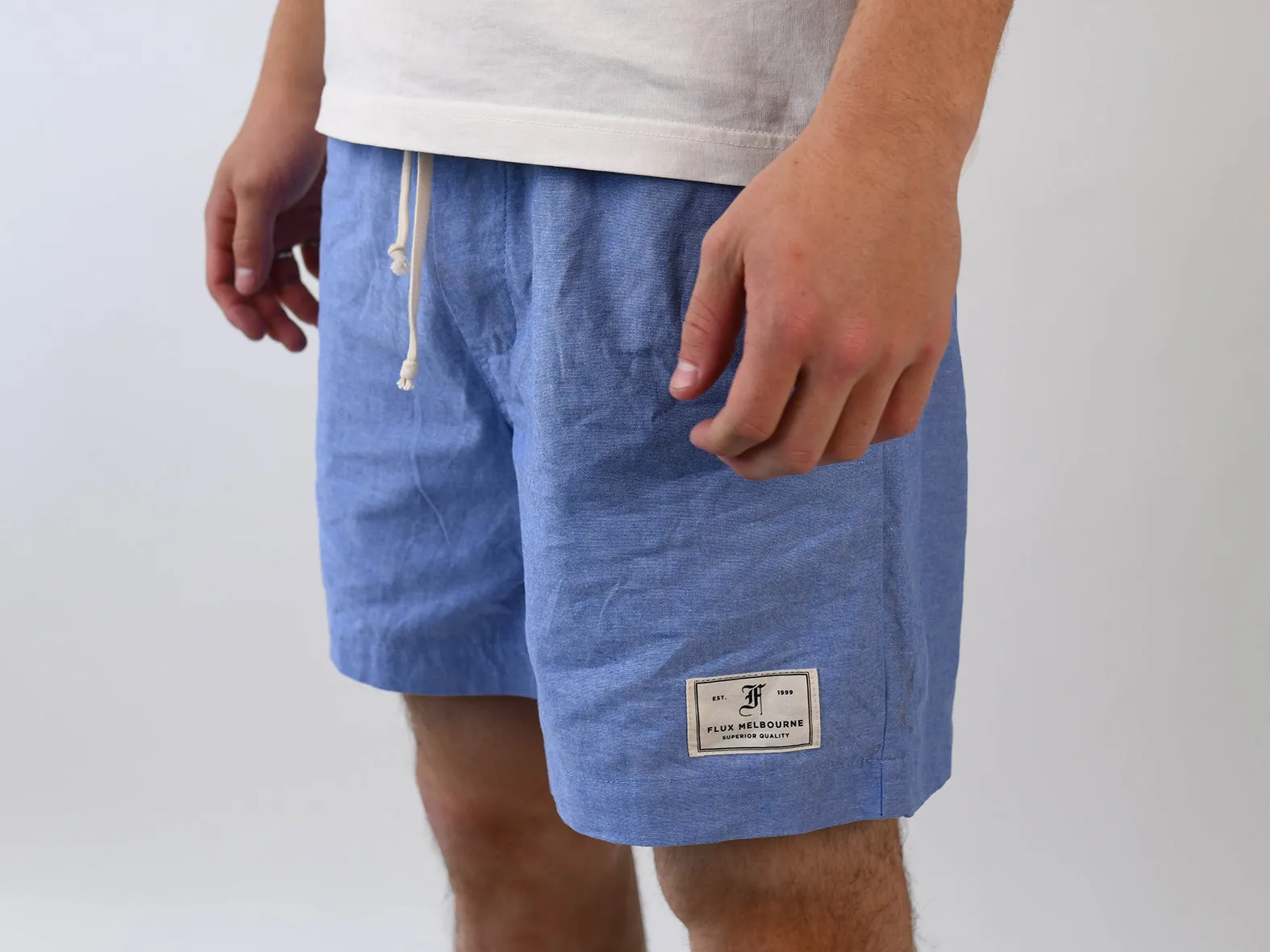 CLUB SHORT. WASHED DENIM
