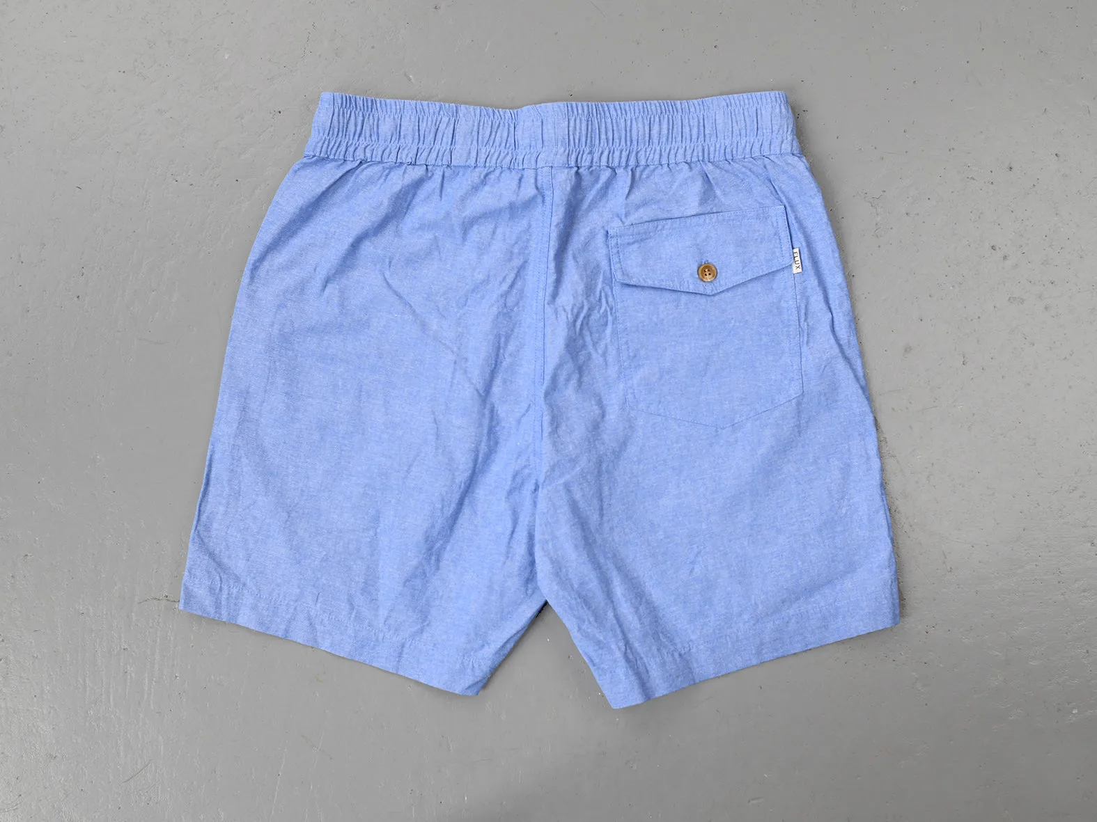 CLUB SHORT. WASHED DENIM
